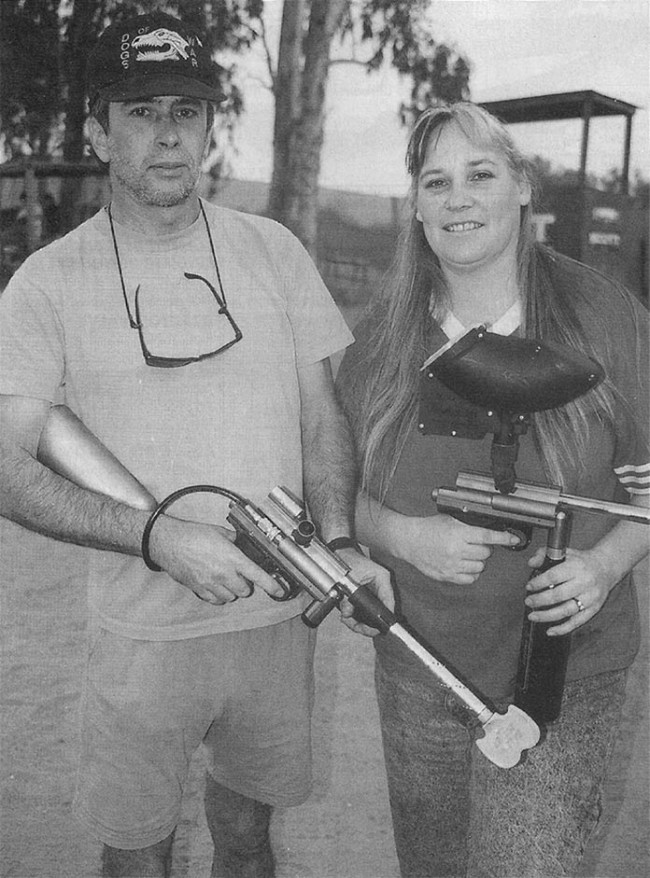 Rick, left, and Lori, right, with their Palmer's Pursuit Shop Blazers, scanned from APG, July, 1997.