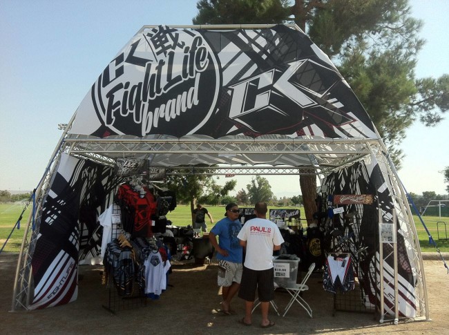 CK Fight Life's giant canopy with Paul and Chris chatting.