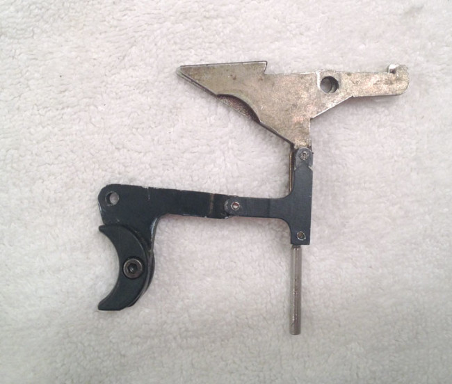 Auto Response sear and linkage on top of an Automag sear