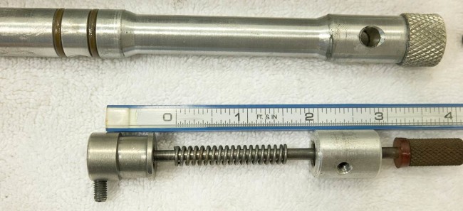 Stock sheridan spring length is 1.5 inches.