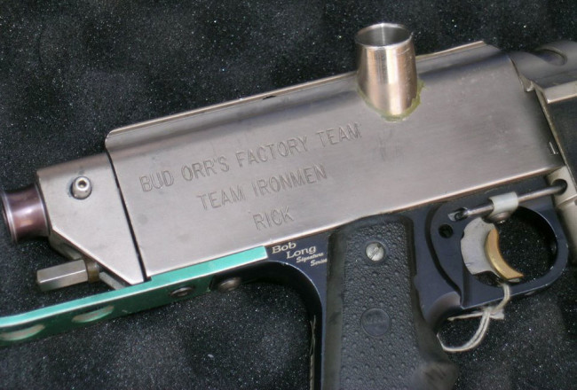 Close up on engraving on Cendejas' Autococker.