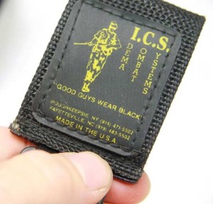 A closer look at the idema logo on this belt loop mask holder.