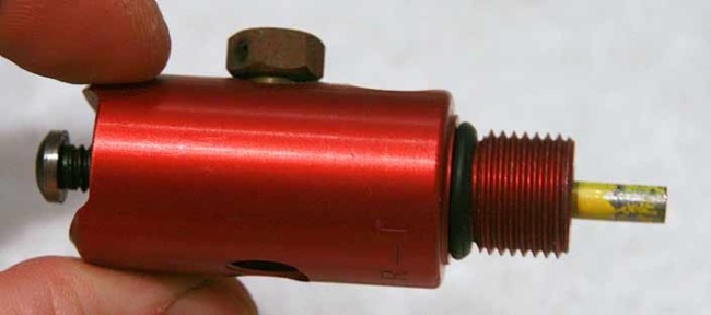 Cooper T vertical tank expansion chamber adapter.