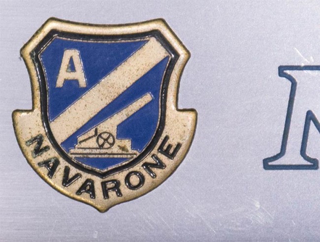 Brass shield on the side of Rick Rector's Navarone Autococker.