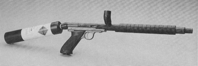 Close up of the ad scanned from the Spring 1989 issue of "Paintball" magazine, which shows the J.A.S. Heckman Competition Brass Bore drop model.