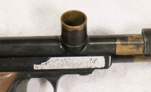 A Right side photo of the direct feed used on the Breech drop Tag model. The Bore drop model has the direct feed further forward and is notched but since no pump handle needs to bypass this feed on the right side there is no need for a notch.