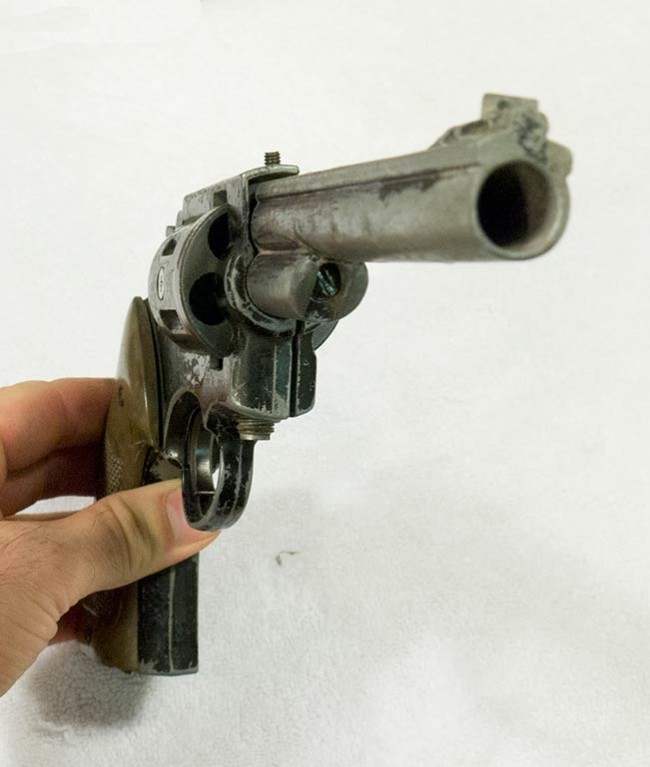 Front angled view of the Mark V 50 pistol.