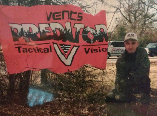Joe Gorscos next to Vents Predator banner.
