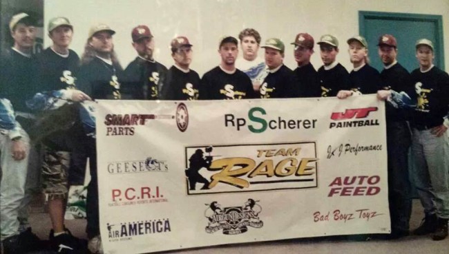 Rage next to team banner showing sponsors.