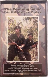 Cover of the Winning Game VHS tape. Front player is holding a Pump Twist Dual.