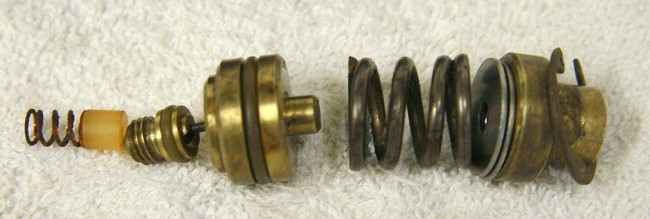 Close up on reg internals arranged as they go back into the reg.