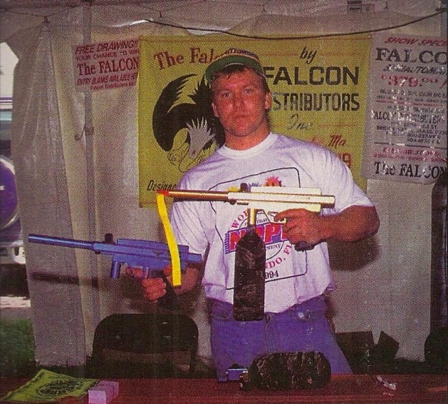 Rob Fox, of Paintball Heaven and Falcon Inc. Rob is holding the Blue and Yellow Falcons. Scanned from a photo printed in the February 1995 issue of PSI.