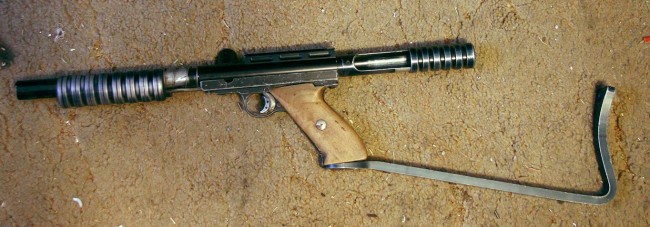 Early Nelspot 007 framed Comp Gun.