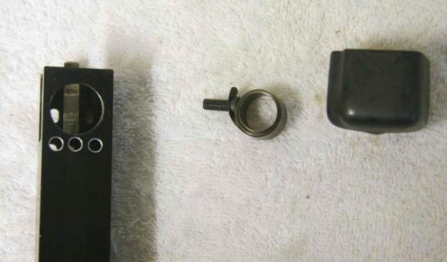 Tippmann SMG 68 Mag, coil spring and mag end cover.