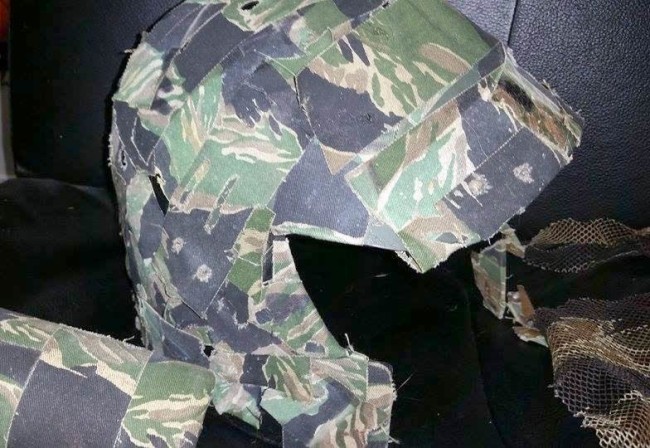 Camo'd out with Tigerstripe camo tape. Camo tape has held up surprisingly well over the years!