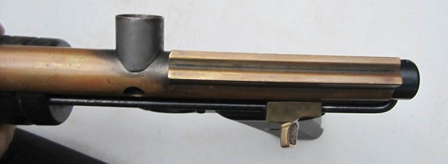 Top right rail view and feed port. Feed port is possibly steel and braised on?  Not 100 percent sure on that.