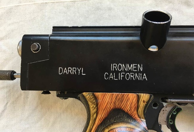 The etching on Darryl's Autococker. Likely acid etched in 1990 by WGP.