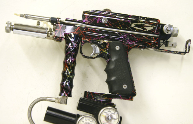 Kapp rainbow splash 1998 Autococker. Left side. "K" engraved logo.