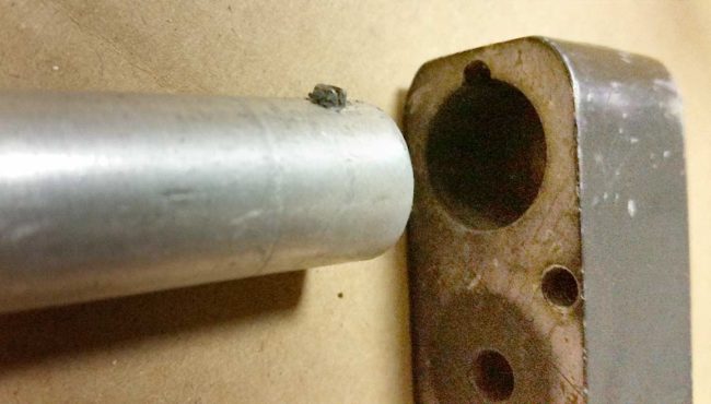 Aligning bolt pin with back block cut will mean bolt inlet hole is facing valve.