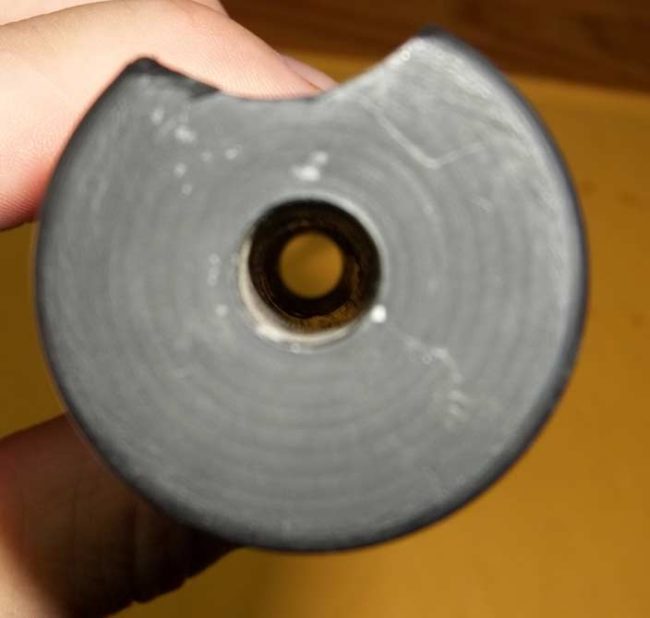 Front of pump handle with pump rod hole drilled straight through.