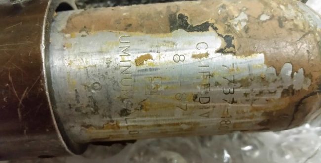 Date on 10oz tank prior to cleaning.