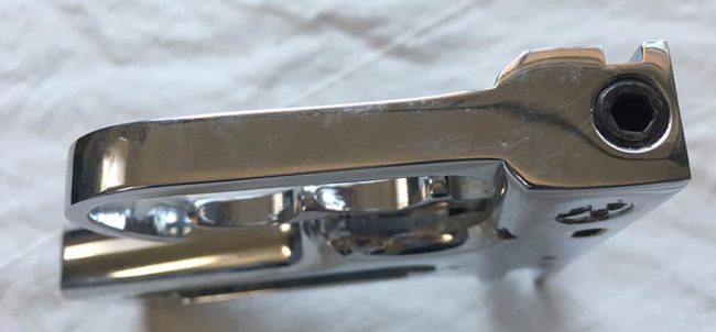 Front view of Kapp frame with allen set screw that retains brass cylinder. 