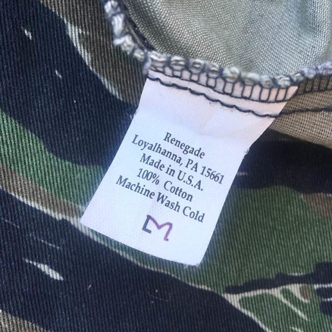 Renegade tag that was marked for a large but someone has written and M over it?