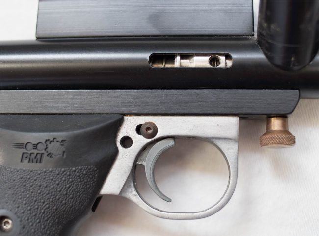 Close up of right side of pinned trigger slide frame to operate as a swing.