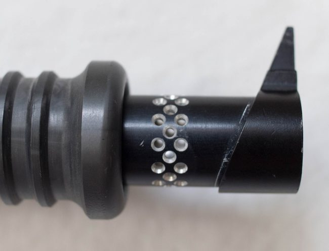 Colin Thompson's signature porting at the end of the barrel.