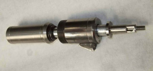 Bolt, hammer, and powertube removed from valve and hammer sleeve taken off. Photo courtesy Paul Cross.