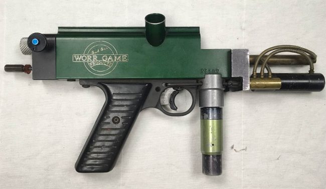 Green Autococker engraved with "Bud Orr Worr Game Products" engraving. These were rental markers at SC Village in the mid 1990s.