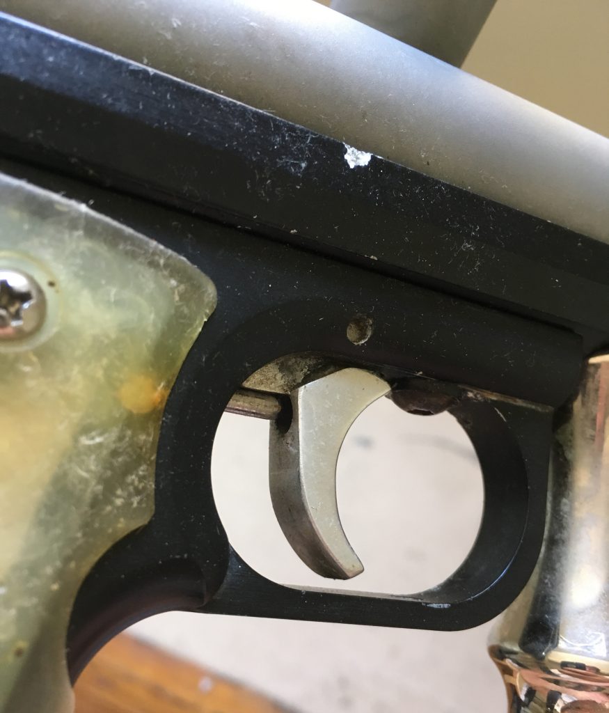 Back right side of aluminum trigger on Proline Automag frame.