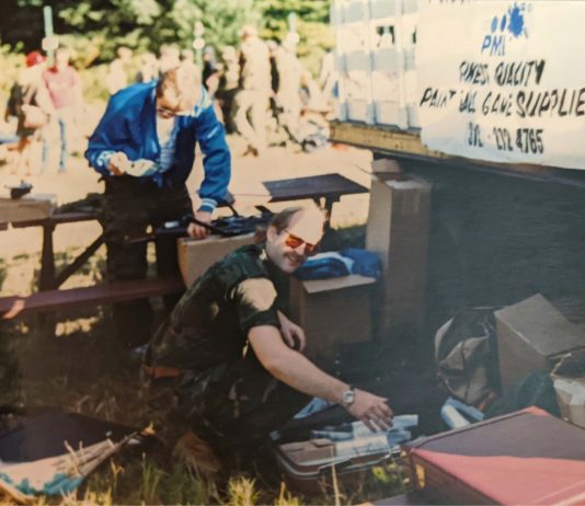 Jeff Perlmutter, in assembly or disassembly of his PMI booth at the 1987 Poconos. Photo credit John Weber. Weber writes,"87 at the Poconos,""