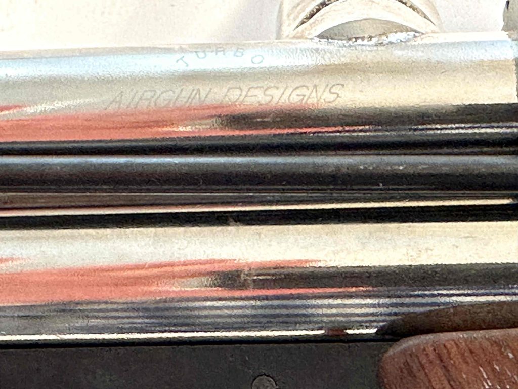 Detail on PMI Piranha Tournament Special Short Barrel with Walnut grips and a matched nickel frame. From the collection of Jeff Perlmutter.